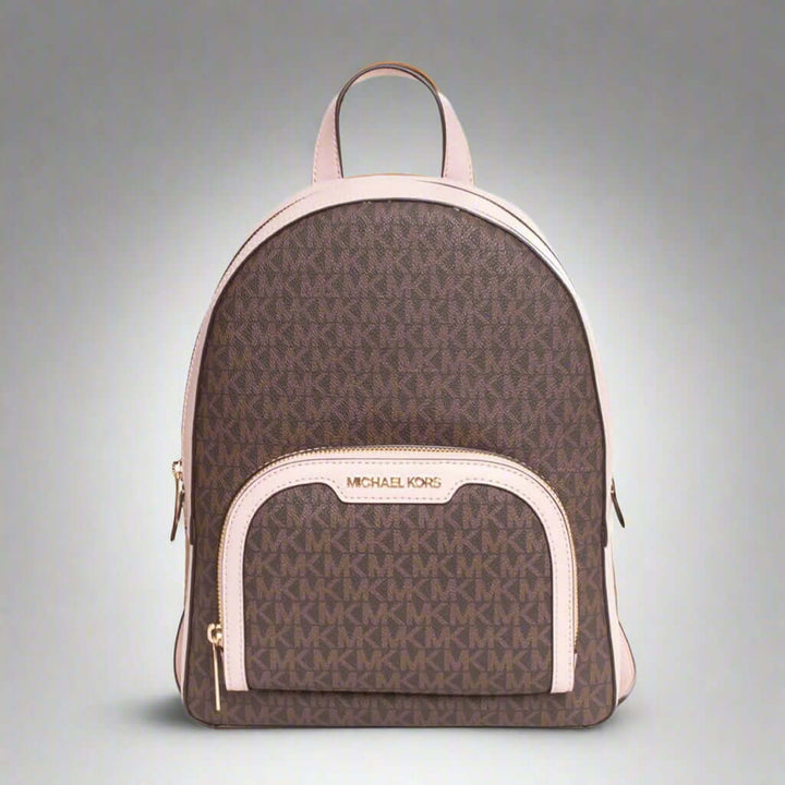 Brown backpack with pink accents and Michael Kors logo on a white background