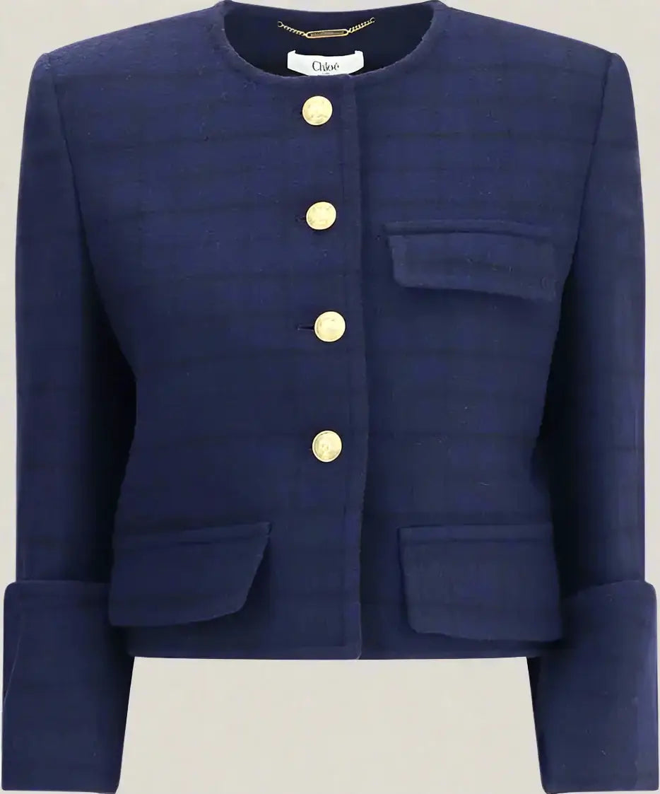 Navy blue jacket with gold buttons on a white background