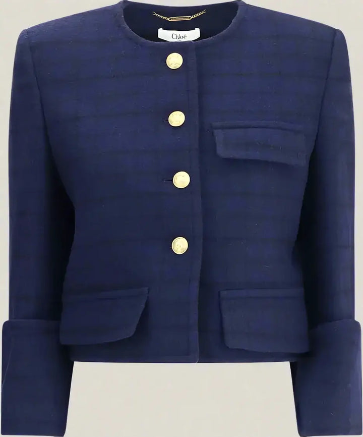 Navy blue jacket with gold buttons on a white background