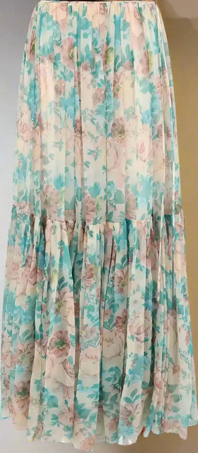 Floral patterned skirt with pastel colors on a plain background