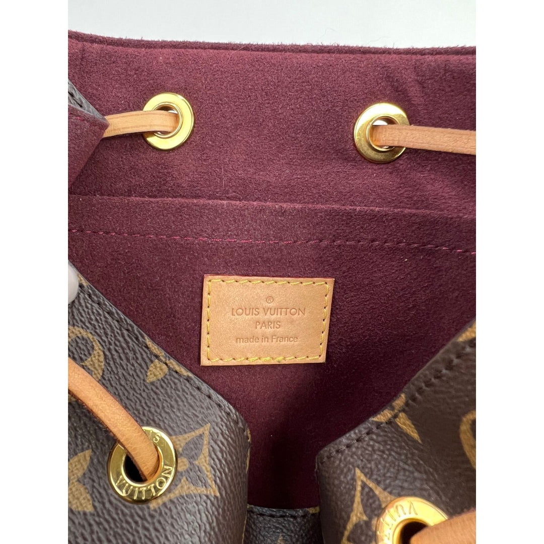 LOUIS VUITTON Montsouris NM Monogram Backpack interior with branded tag and marron microfiber lining