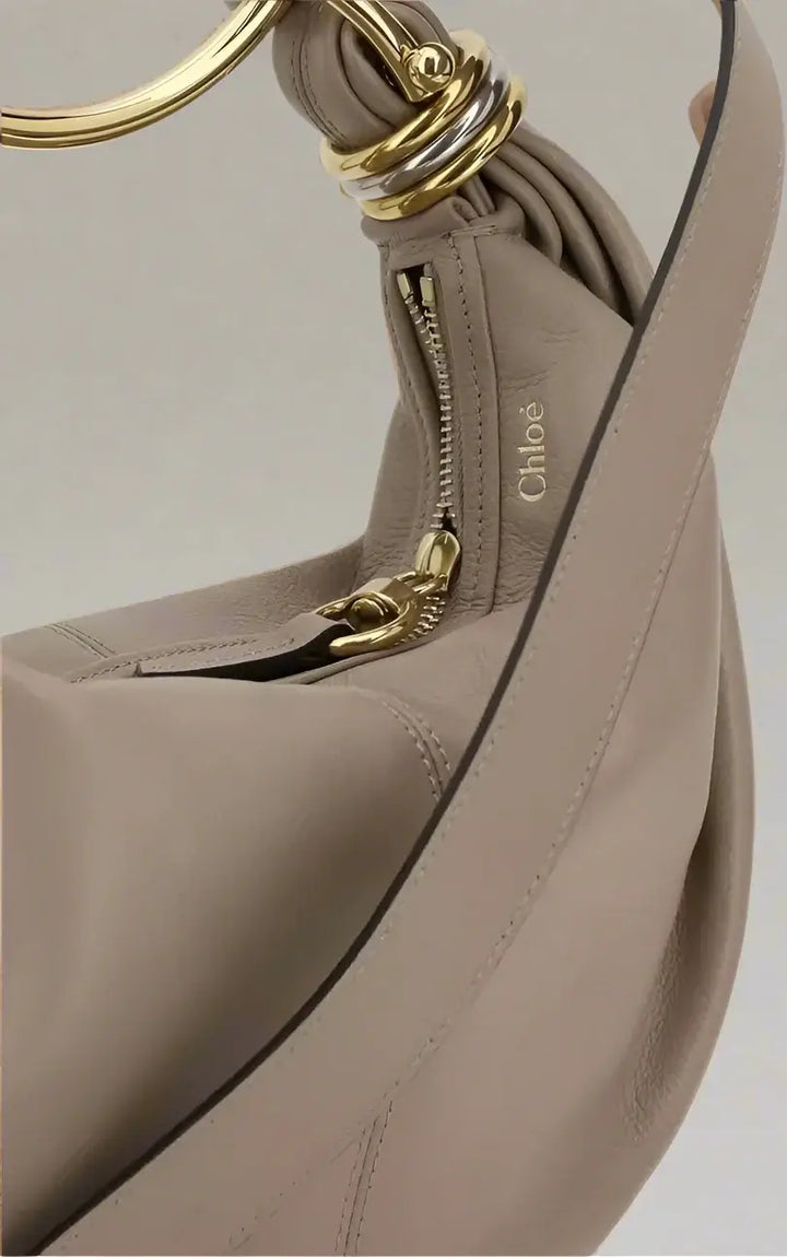 Chloé Bracelet Handbag in beige with metallic carry handle