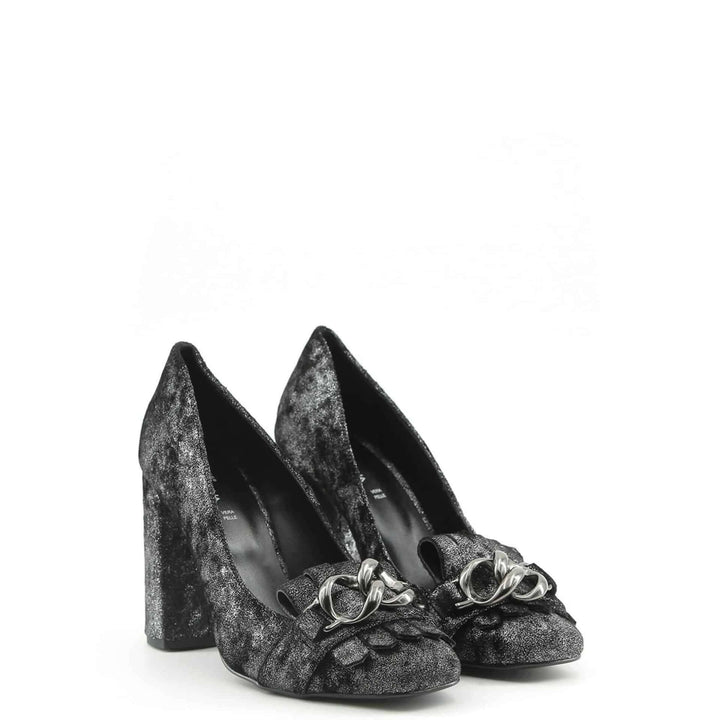 Pair of black high-heeled shoes with decorative elements on a white background