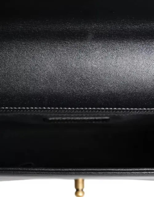 Preloved CHANEL classic quilted handbag front view Authentic CHANEL black leather flap bag CHANEL gold chain shoulder bag – preloved Vintage CHANEL logo clutch purse Secondhand CHANEL luxury tote with dust bag