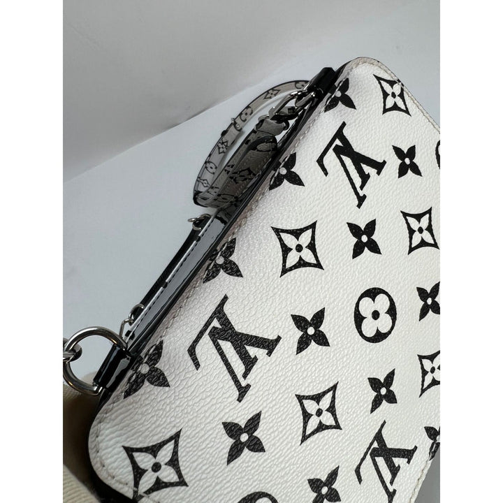 LOUIS VUITTON Hot Springs Backpack White Monogram and Patent Leather luxury bags view showcasing monogram detail.