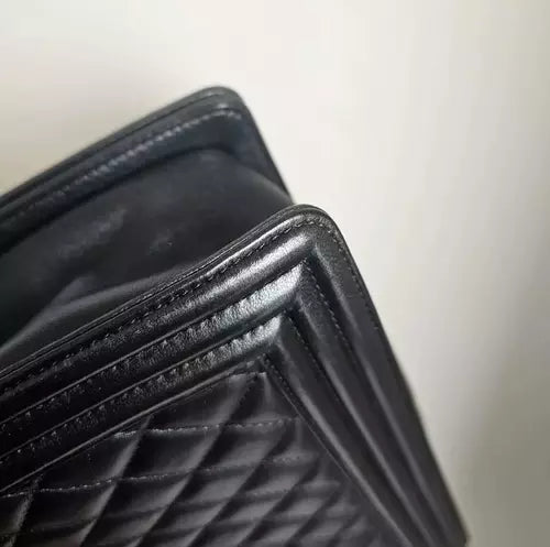 Preloved CHANEL classic quilted handbag front view Authentic CHANEL black leather flap bag CHANEL gold chain shoulder bag – preloved Vintage CHANEL logo clutch purse Secondhand CHANEL luxury tote with dust bag