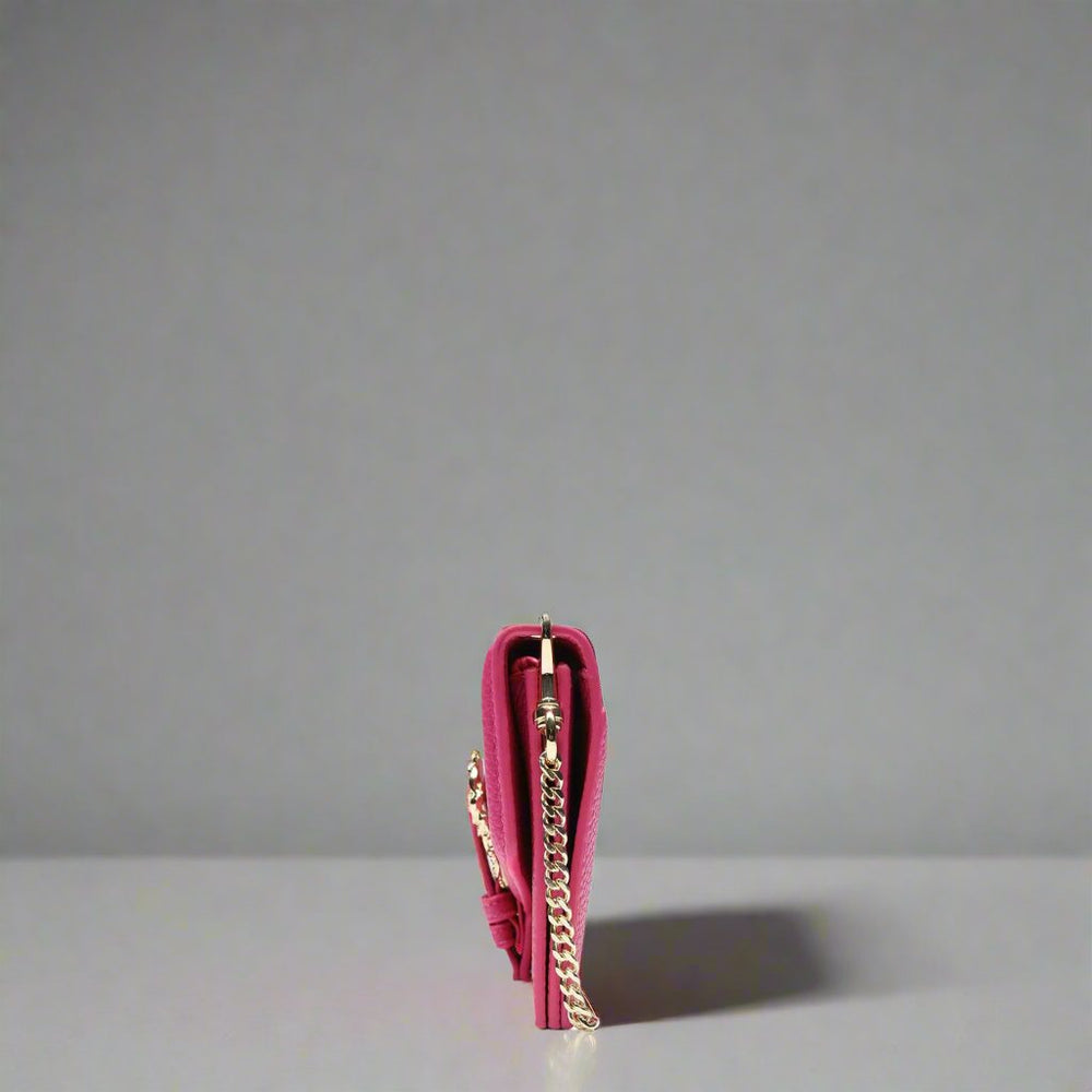 Versace Jeans wallet in pink with gold chain, showcasing sleek design, perfect for women, and ideal for credit cards and coins.