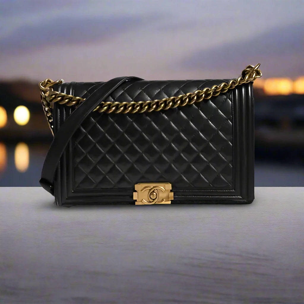 Preloved CHANEL classic quilted handbag front view Authentic CHANEL black leather flap bag CHANEL gold chain shoulder bag – preloved Vintage CHANEL logo clutch purse Secondhand CHANEL luxury tote with dust bag
