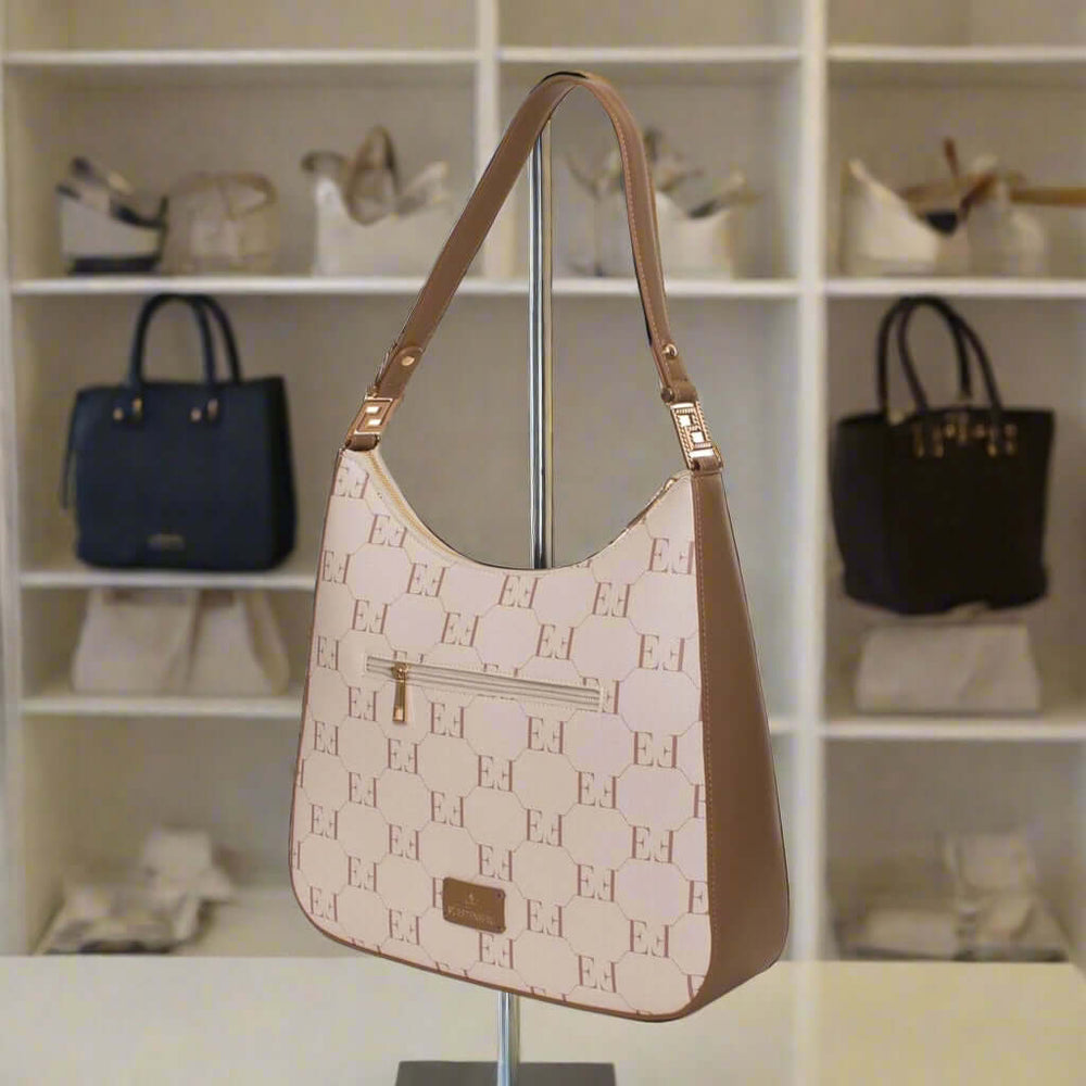 Beige handbag with brown accents on a white background
