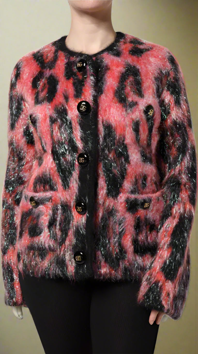 Red and black patterned jacket worn by a person on a white background