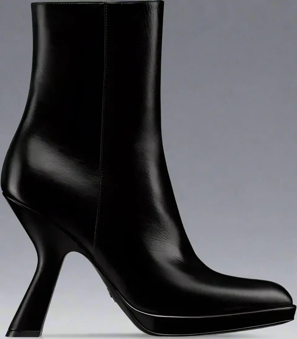 Black high-heeled ankle boots on a white background