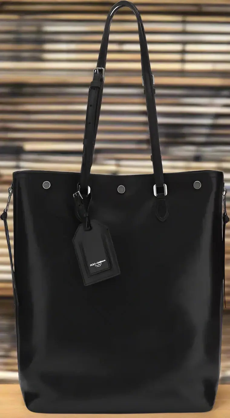 Black tote bag with a tag on a white background