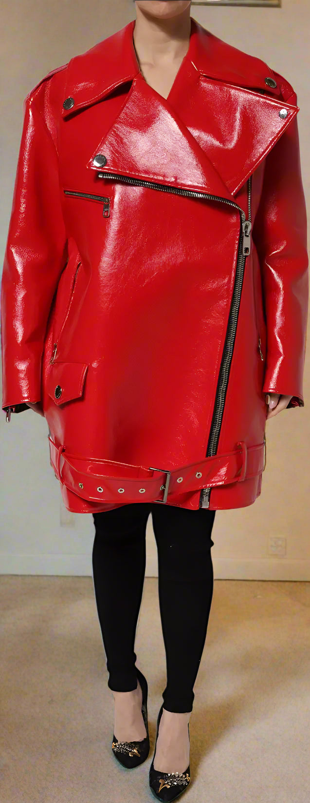 Red leather jacket with black zippers on a white background