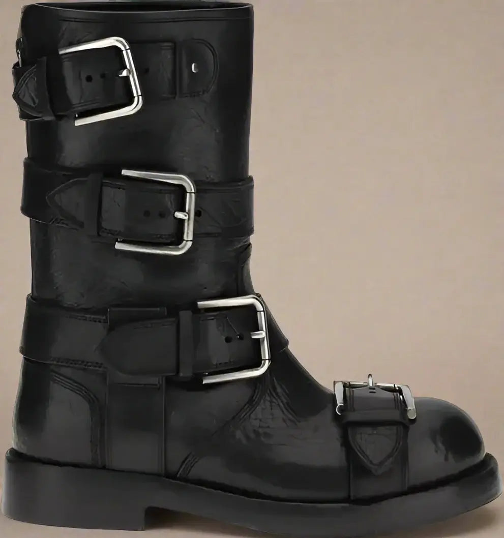 Black leather boot with multiple buckles on a white background