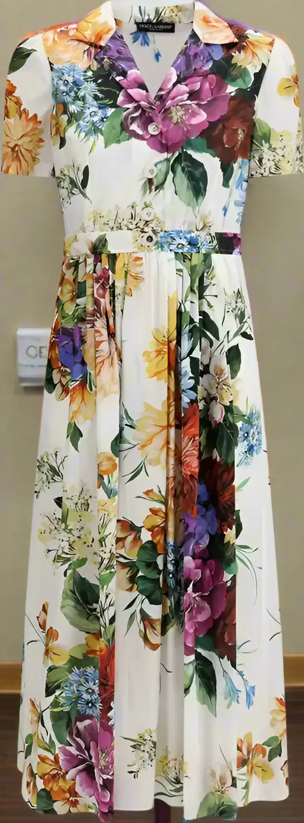 Floral dress with a colorful pattern on a white background