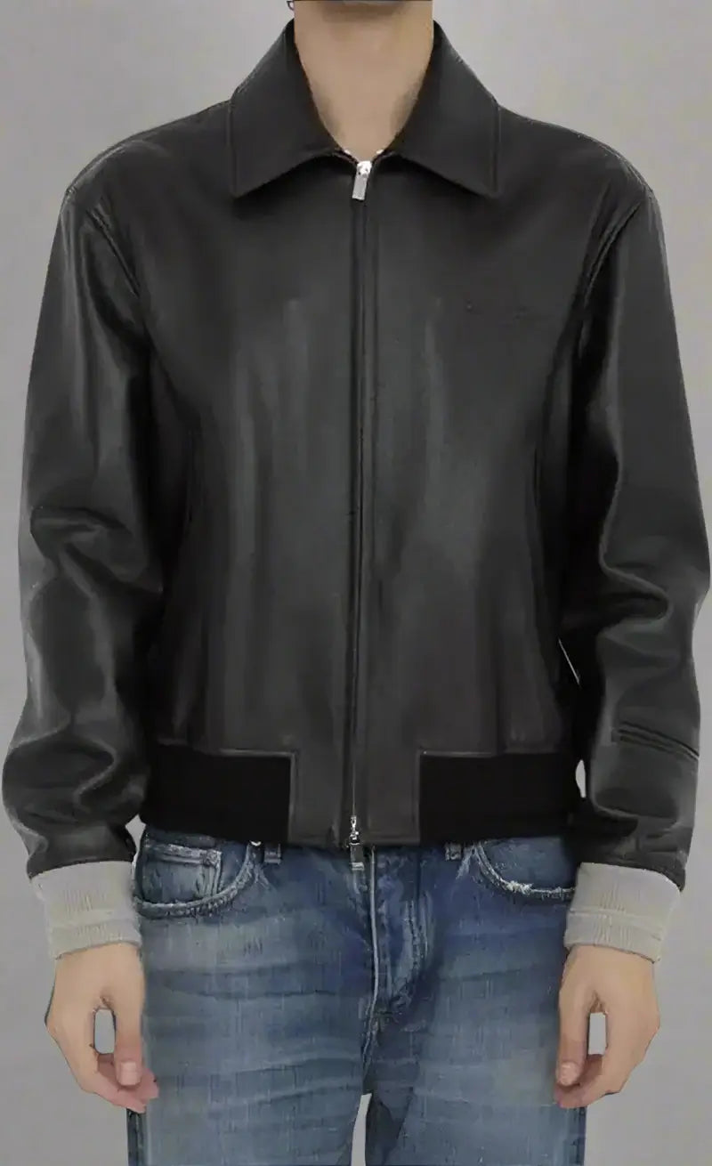 Black leather jacket worn by a person on a white background