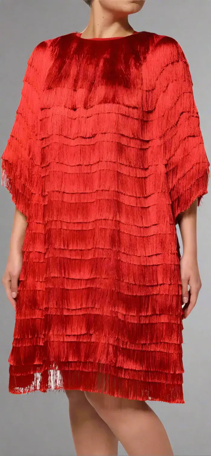 Red ruffled dress worn by a model on a white background