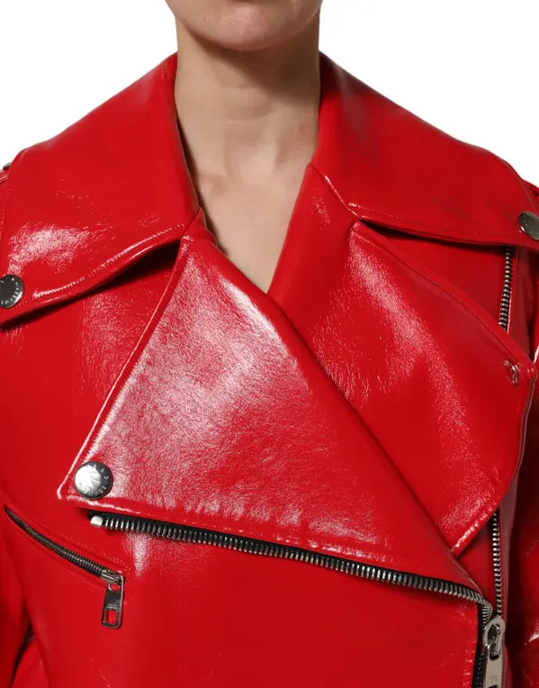 Close-up of a red leather jacket with a white background