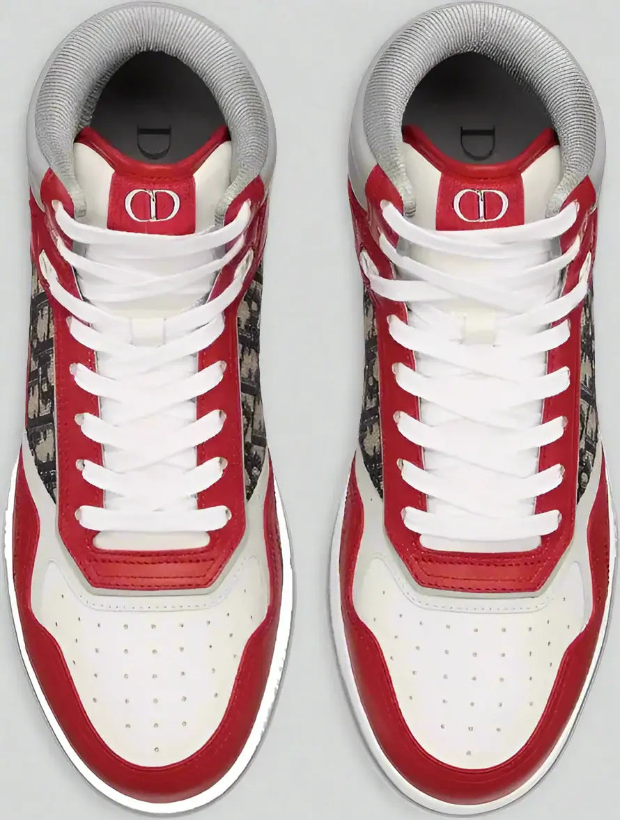 Red and white sneakers with a brand logo on a white background