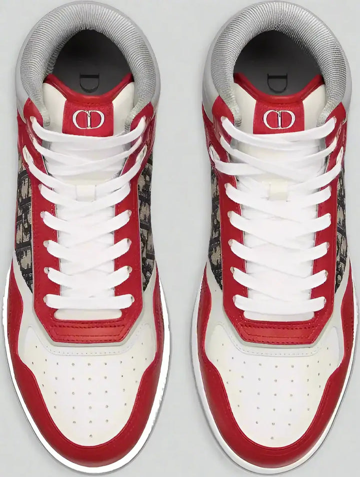 Red and white sneakers with a brand logo on a white background