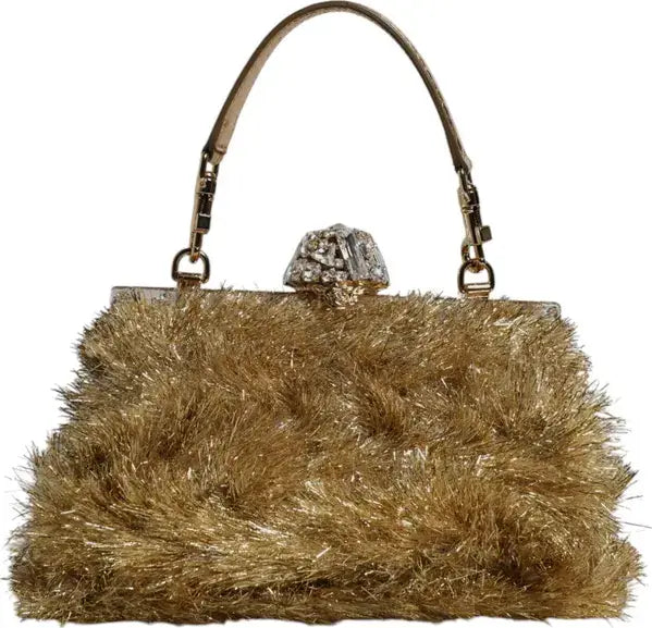 Gold metallic handbag with textured surface and decorative clasp on a white background