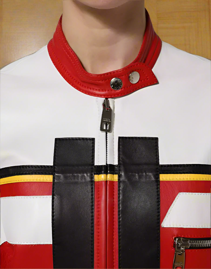 Close-up of a red, white, and black jacket with a zipper