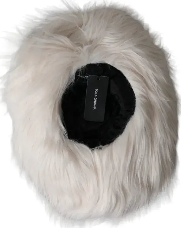 White fluffy fur hat with a black tag on a white background