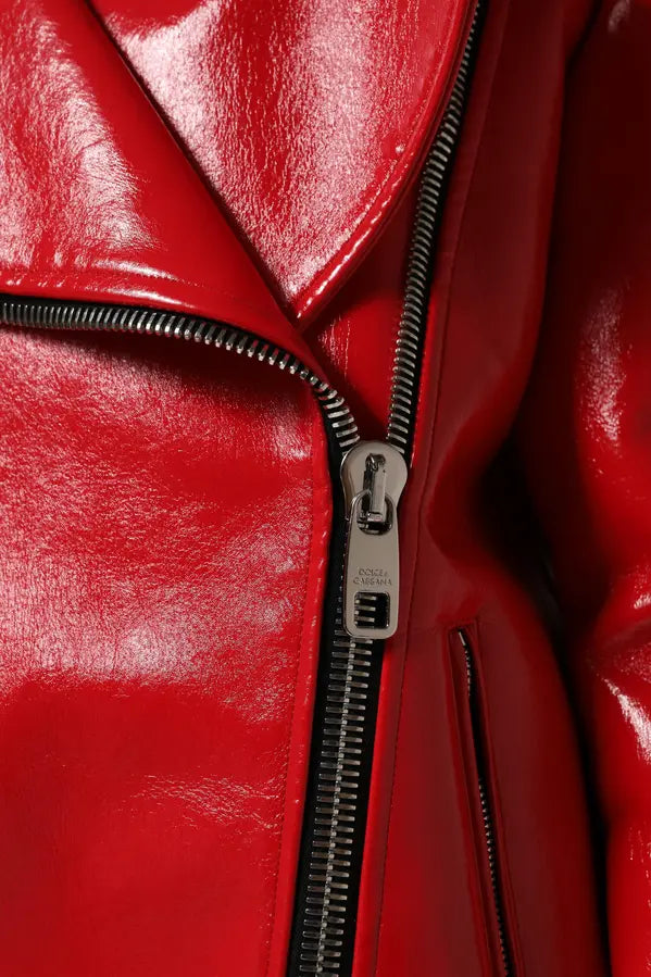 Close-up of a red leather jacket with a zipper