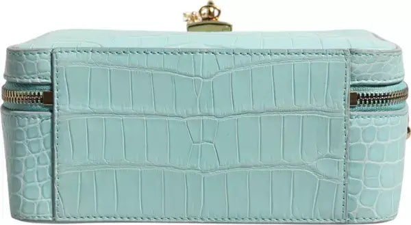 Light blue crocodile patterned jewelry box with gold accents