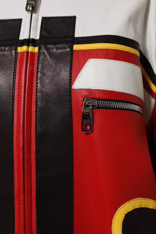Close-up of a red and black jacket with a zipper detail.