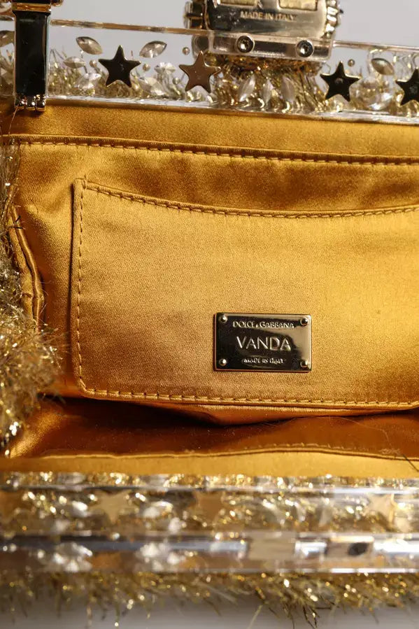 Gold handbag with 'VANDA' label and decorative elements