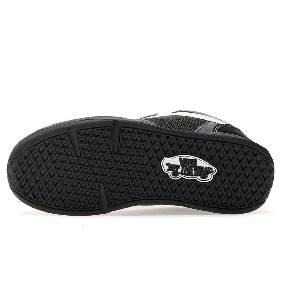 Black sneaker sole with a brand logo on a white background