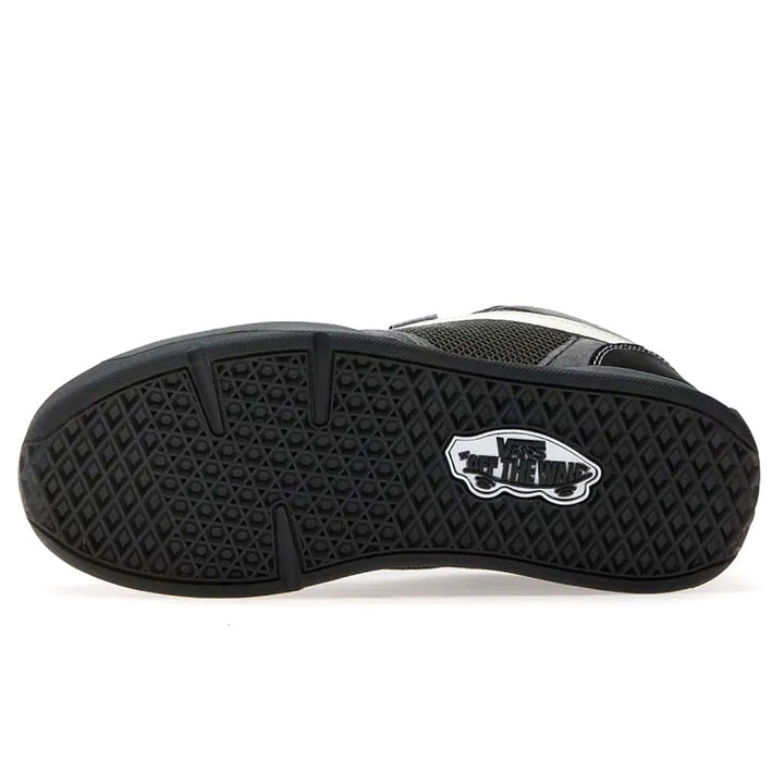 Black sneaker sole with a brand logo on a white background
