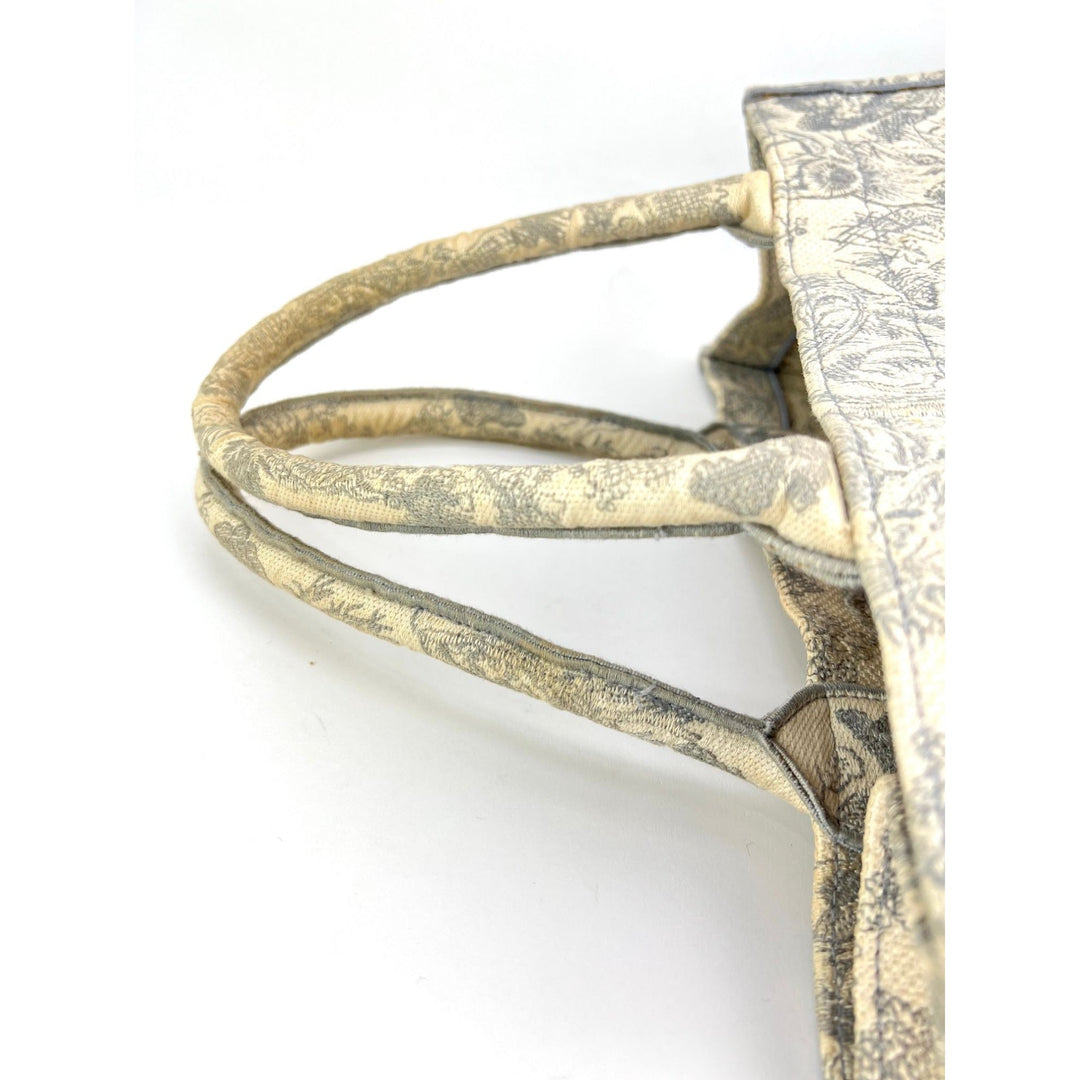Close-up of a decorative headband with intricate patterns on a white background