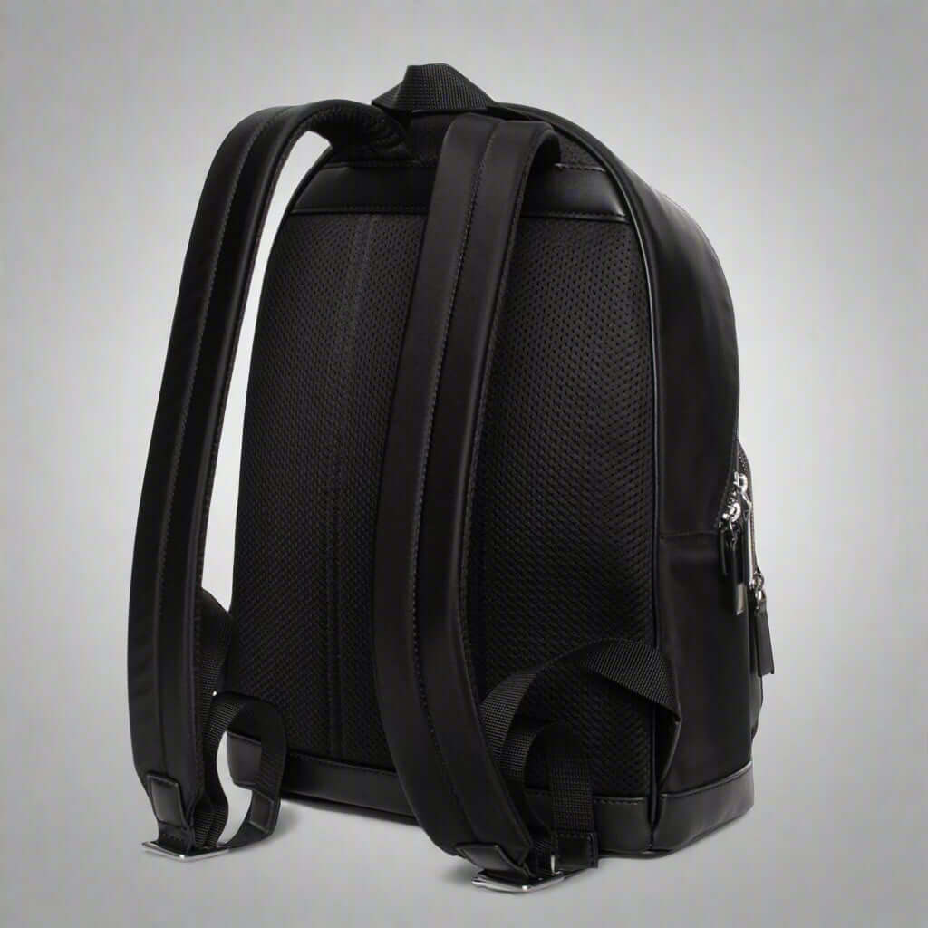 Black backpack on a white background