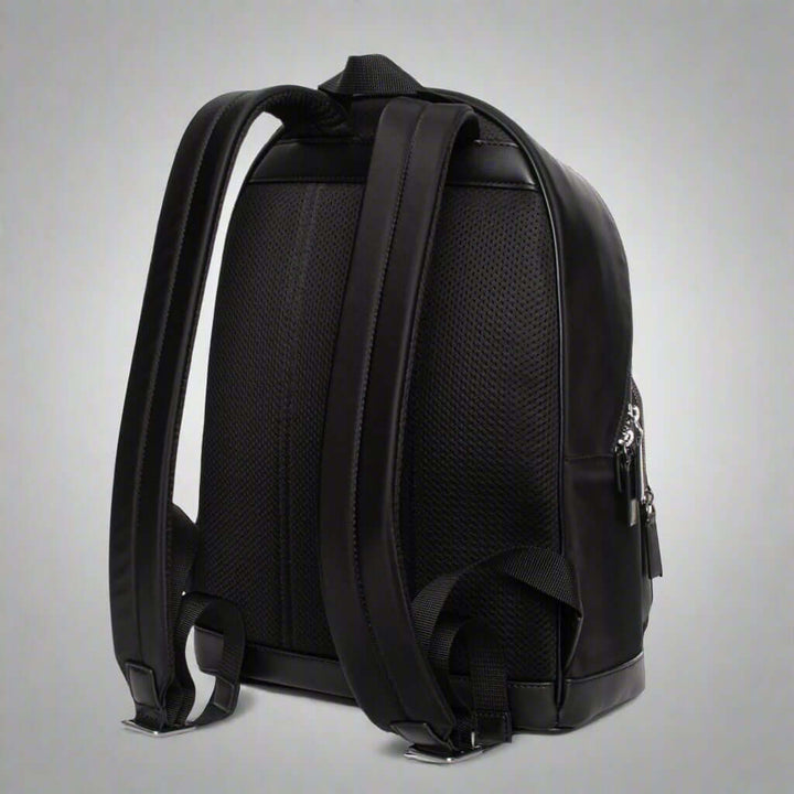 Black backpack on a white background