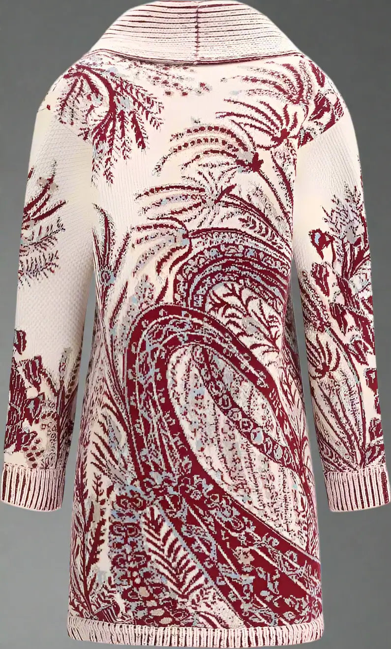 Knitted cardigan with red paisley pattern on a white background