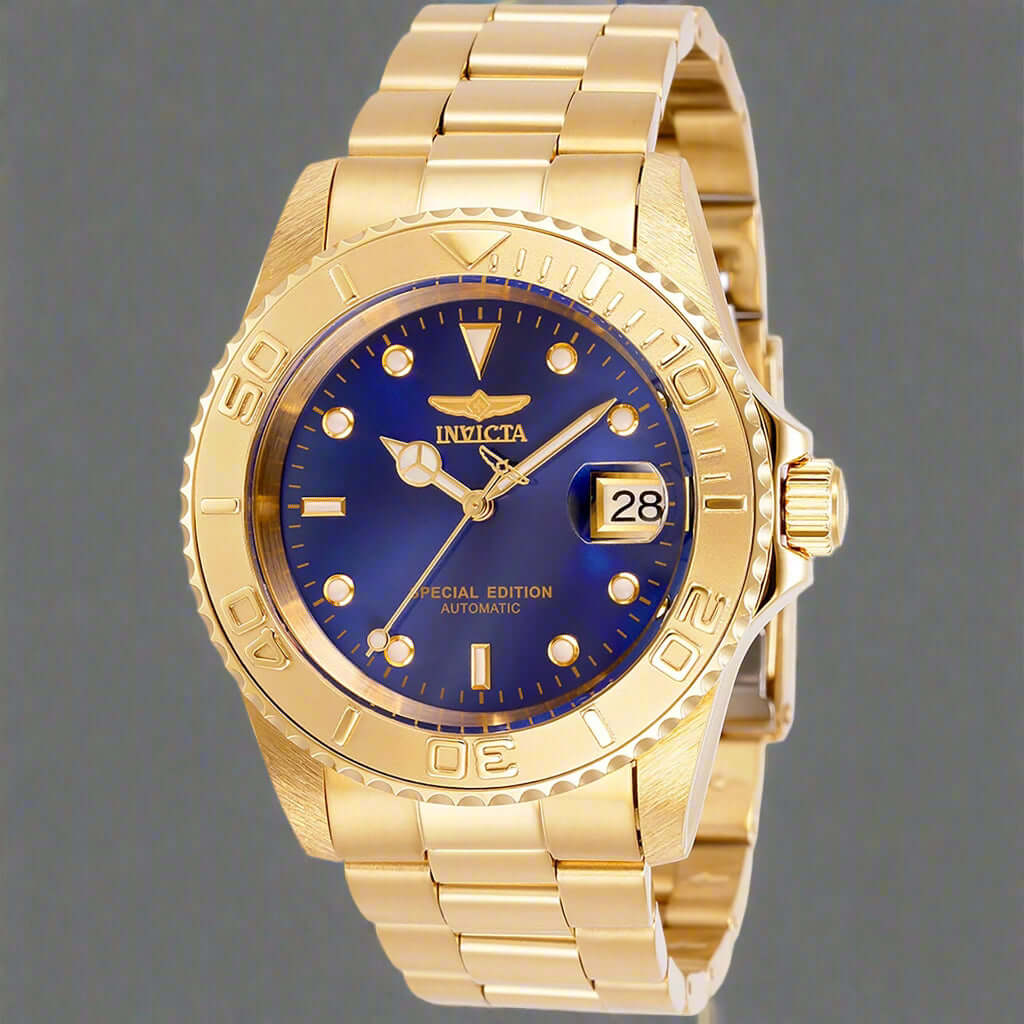 INVICTA Pro Diver men's watch with stainless steel band INVICTA black graphic t-shirt with logo front Gold-tone INVICTA chronograph wristwatch close-up INVICTA men's button-down shirt with embroidered detail INVICTA oversized sport watch and branded appar