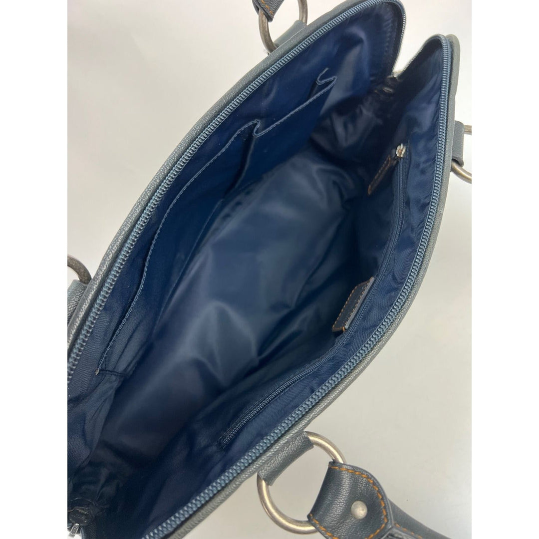 Interior view of CHRISTIAN DIOR Monogram Trotter CD Blue Canvas Hand Bag showcasing navy nylon lining and compartments.
