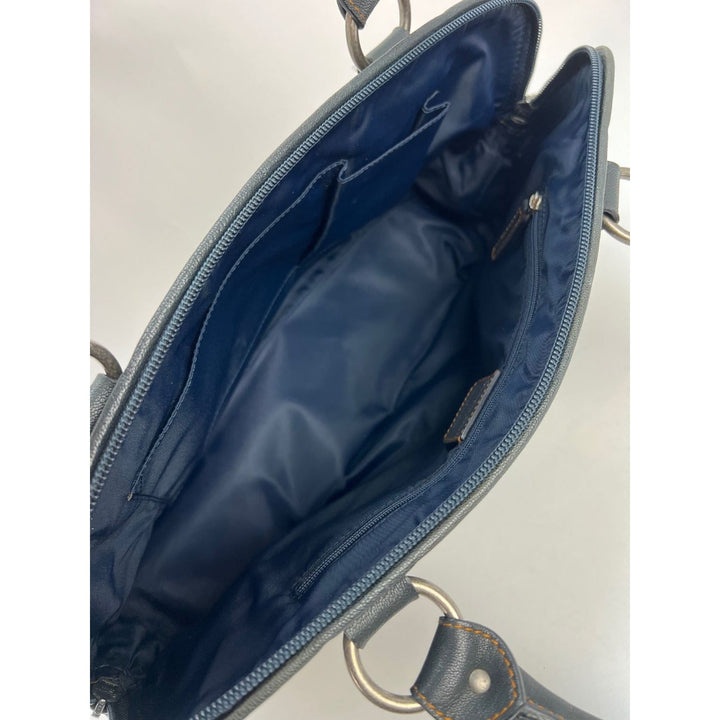 Interior view of CHRISTIAN DIOR Monogram Trotter CD Blue Canvas Hand Bag showcasing navy nylon lining and compartments.