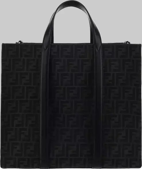 Black tote bag with a monogram pattern on a white background