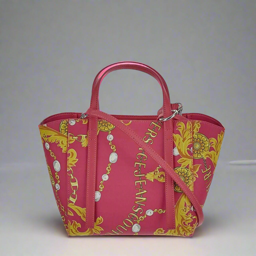 Versace Jeans Couture shopping bag in pink with gold emblem, synthetic leather, removable strap, and two handles.