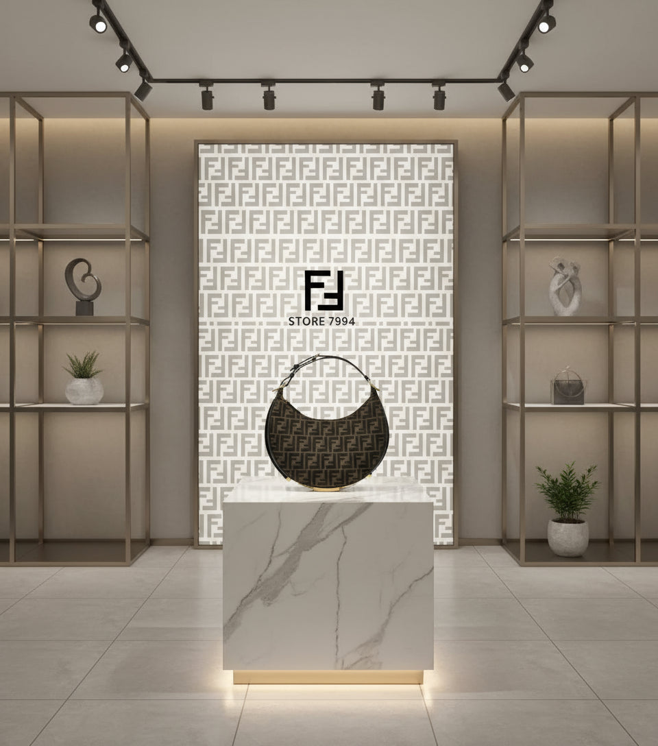 Designer handbag with monogram pattern on a white background