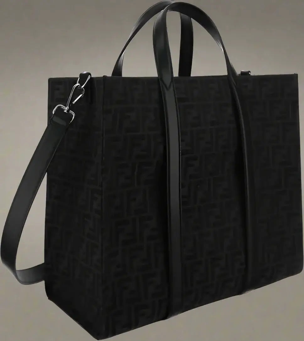Black textured tote bag with a strap on a white background