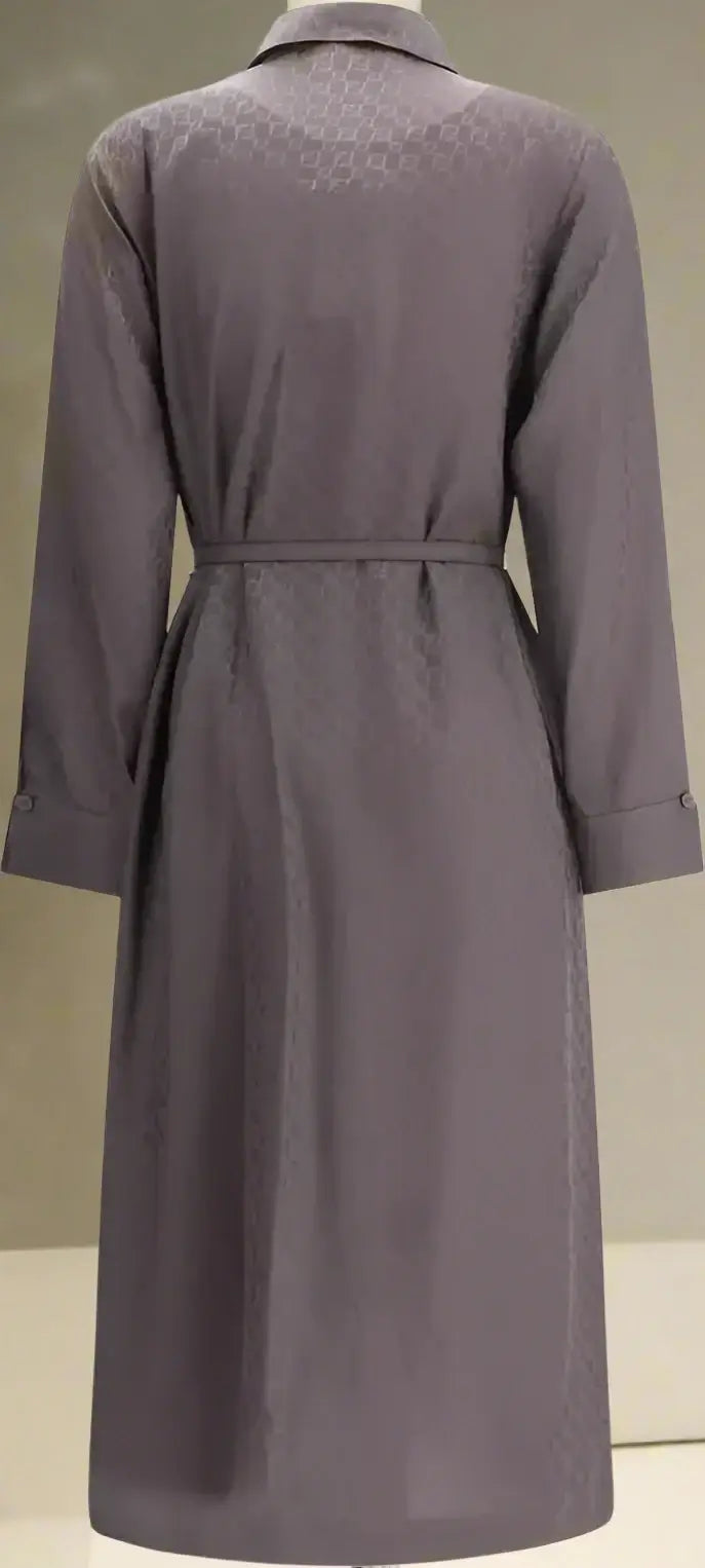 Gray textured coat with a belt on a plain background