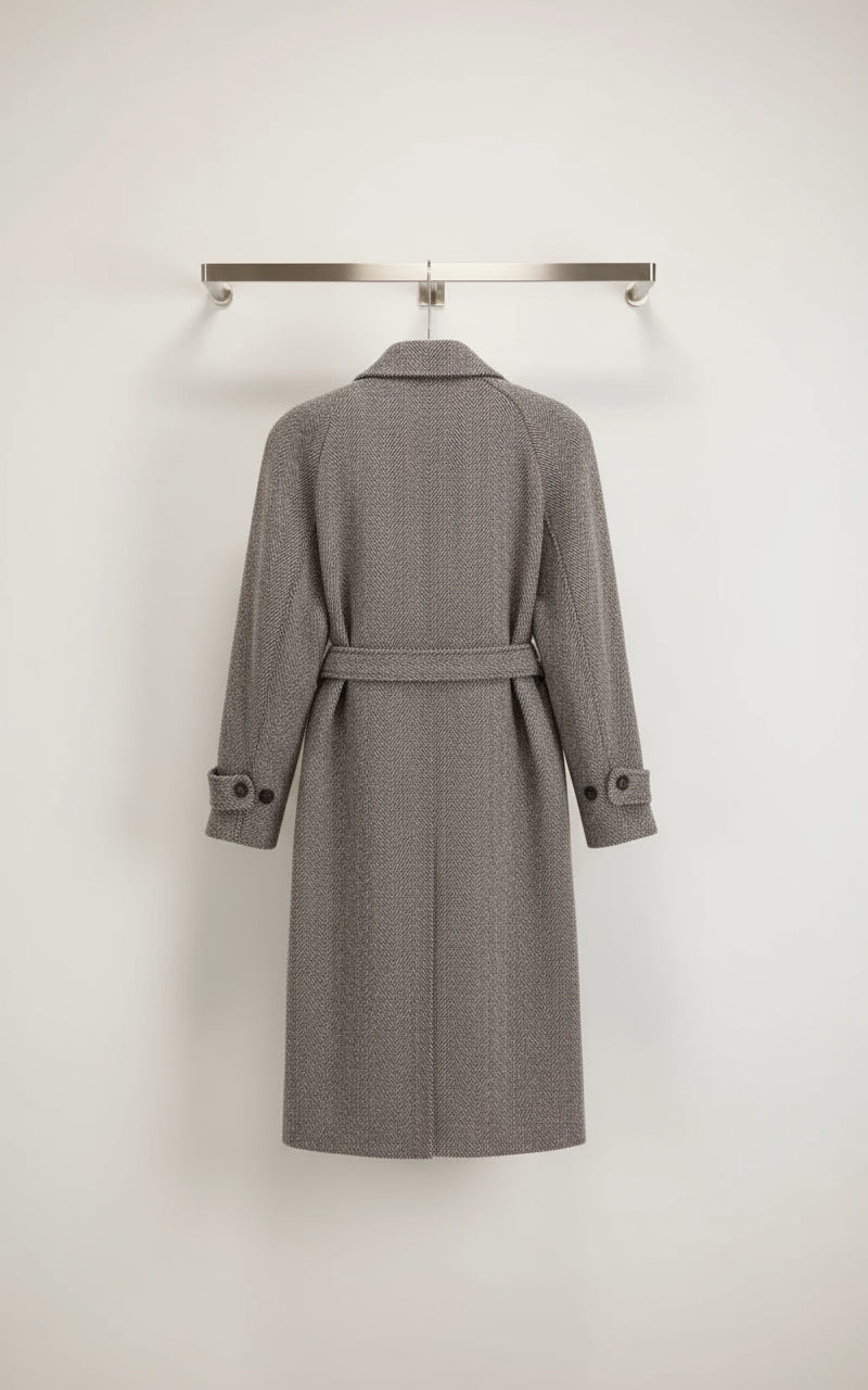 Gray coat with a belt on a white background