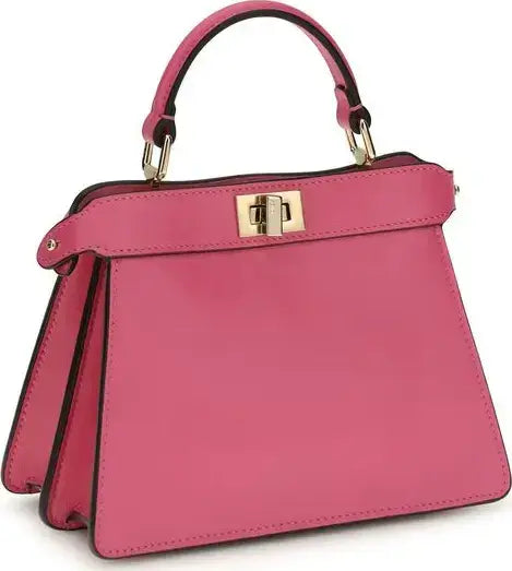 Pink handbag with gold clasp on a white background