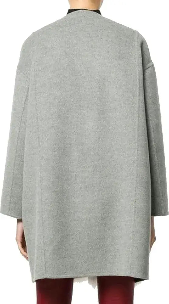Gray coat worn by a person on a white background