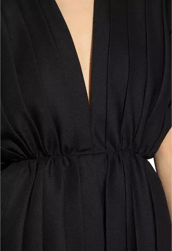 Black dress with a deep neckline and belt detail