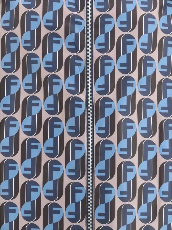 Patterned fabric with blue and gray shapes on a beige background